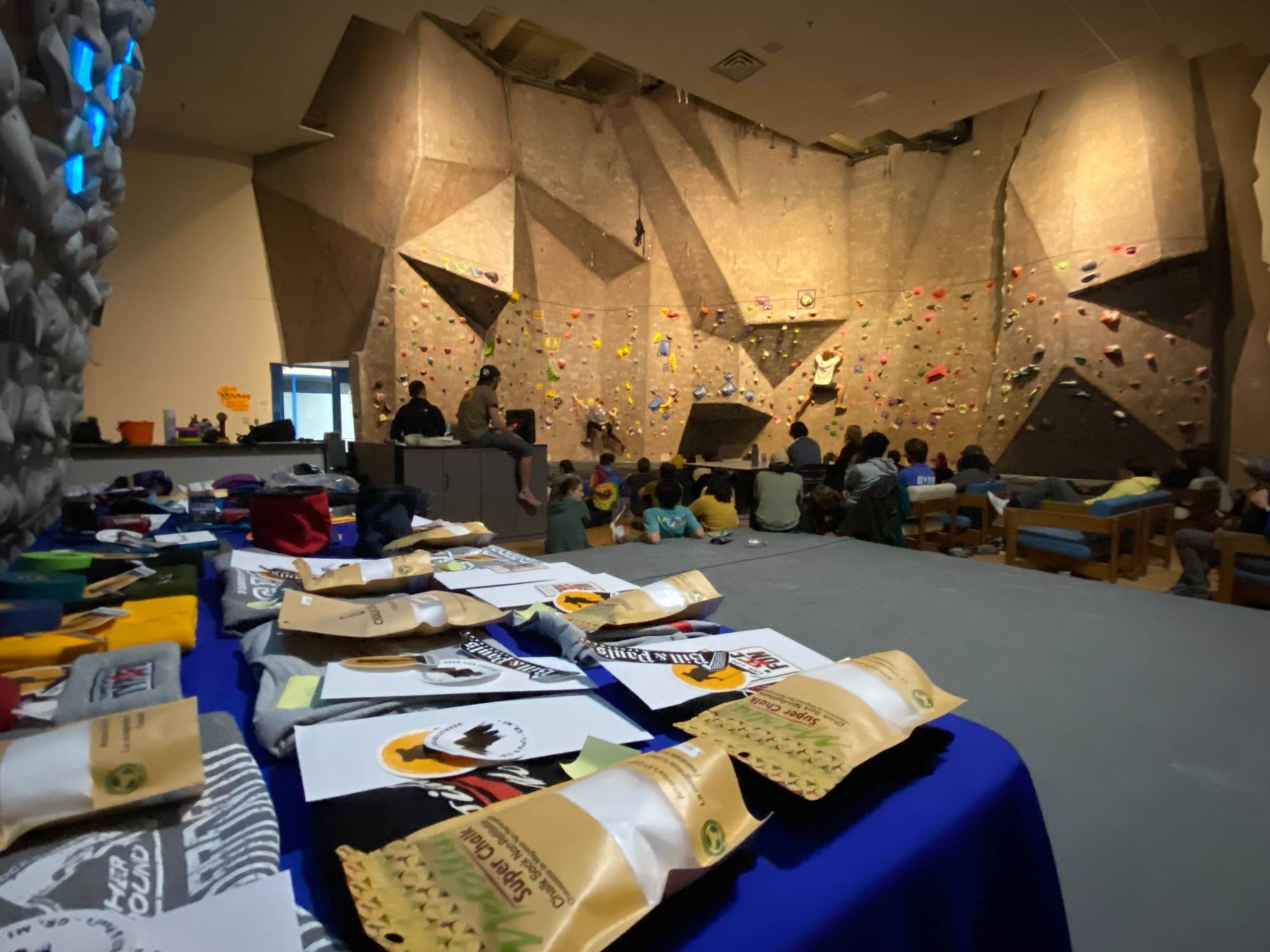prize table and finalist spectators